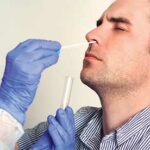 Man receiving test for COVID-19