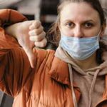 Woman unhappy about wearing a mask for safety