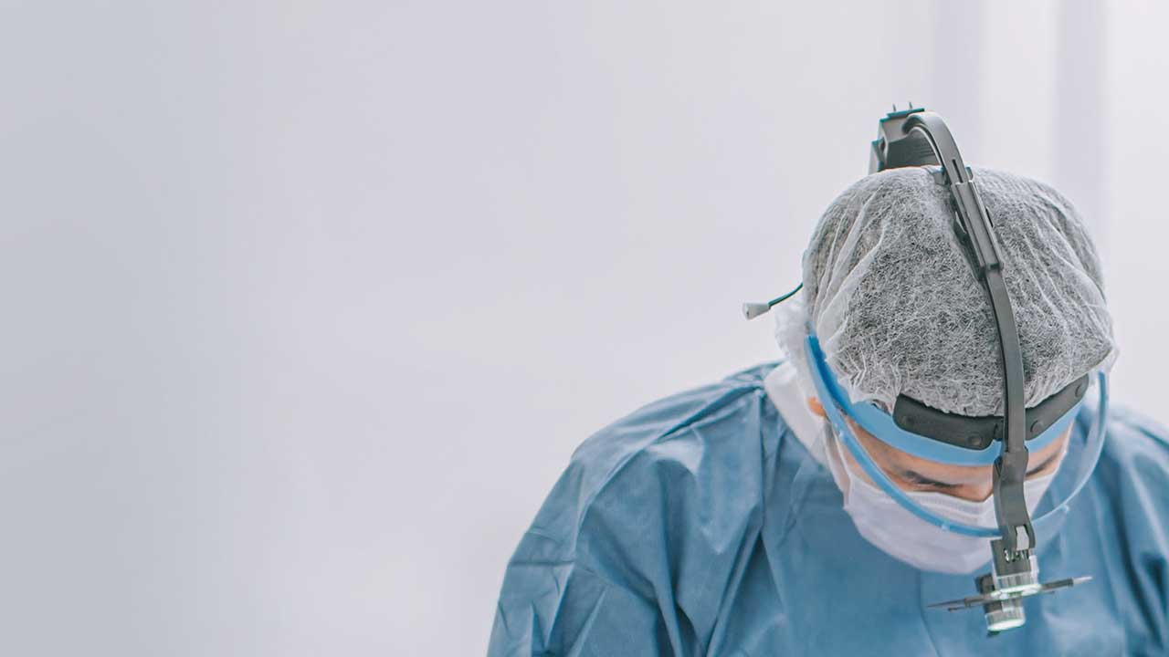 Clinician providing dental care to patient