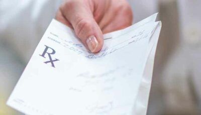 hand holding an rx subscription