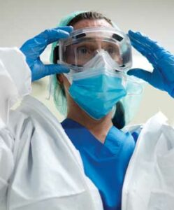 person putting on goggles