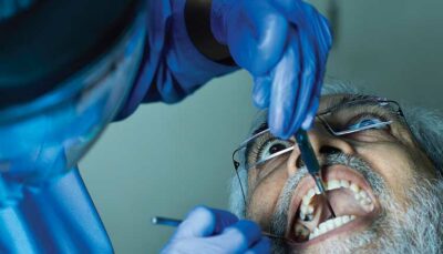 close up of man having dental exam