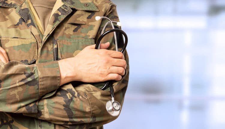 military doctor with crossed arms at a hospital