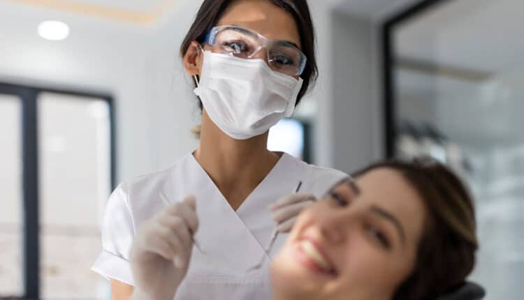 female dentist and female patient