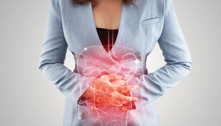 Business Woman touching stomach painful suffering from enteritis