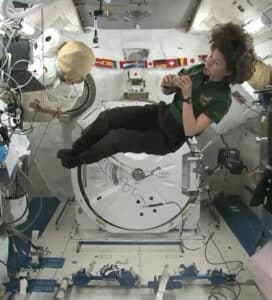 female astronaut in space