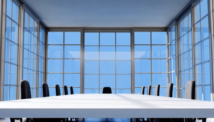Conference table and chairs in an empty meeting room